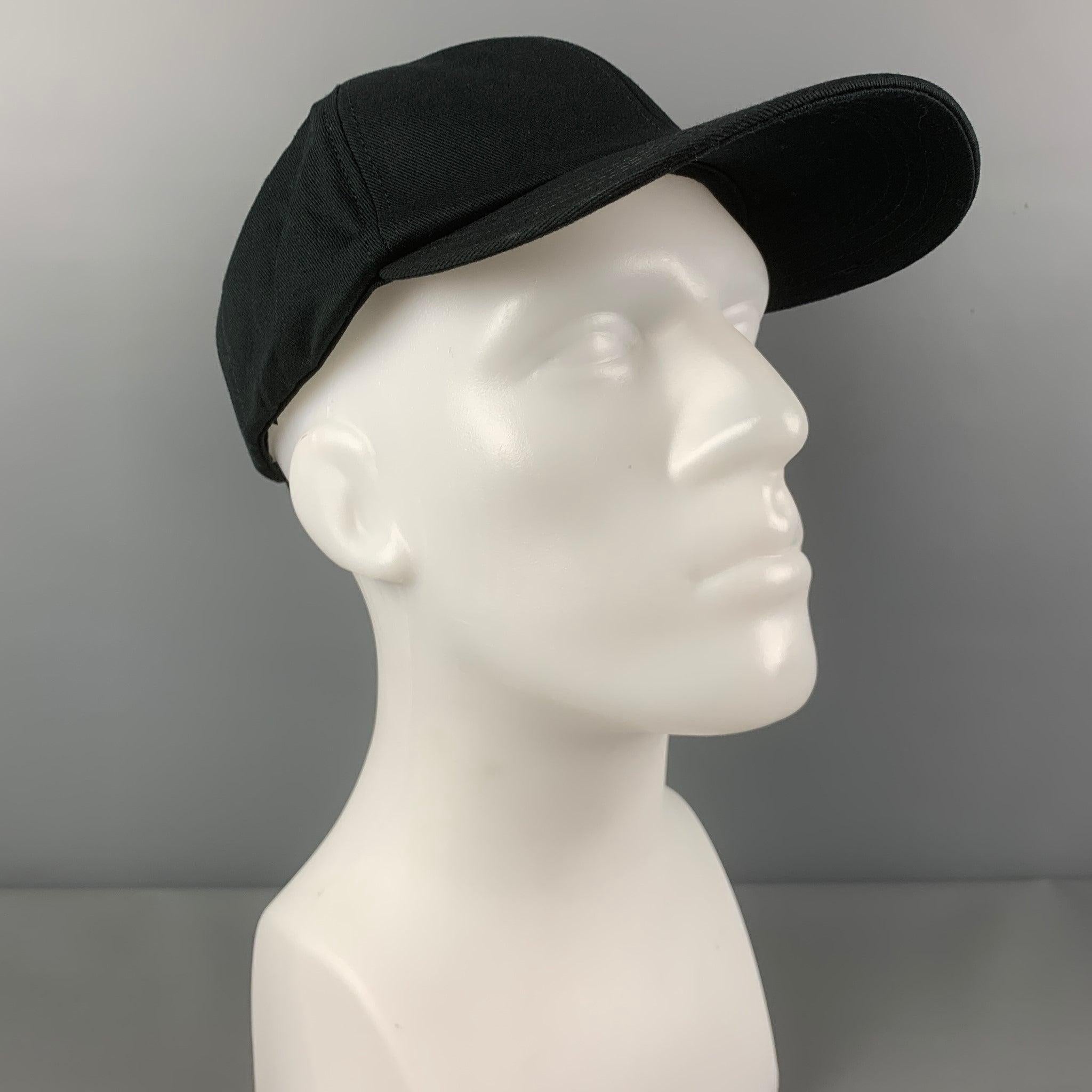 OFF-WHITE hat comes in a black cotton featuring a 