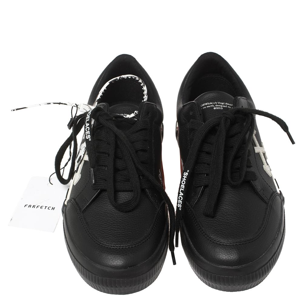 These trendy Vulcanized sneakers from Off-White will amp up your style. Crafted from black & white leather, they are styled with round toes, lace-ups on the uppers, durable rubber soles, and branded elements.

Includes: Original Dustbag
