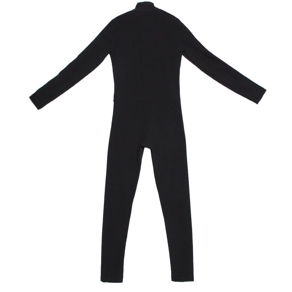 Make a statement with this stylish and comfortable jumpsuit from the house of Off-White. Crafted from quality materials, it carries a black hue. The ribbed creation flaunts logo band detailing that is a signature of the brand and adds interest. It