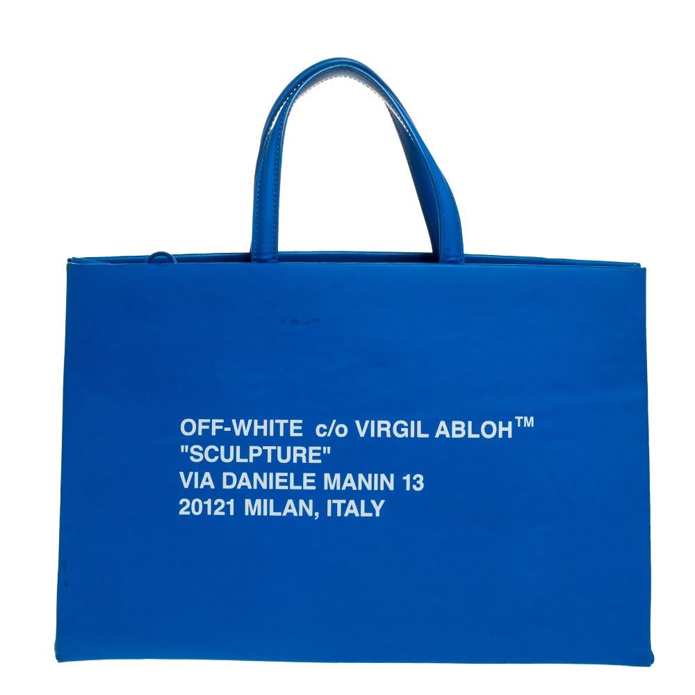 An Off-White bag to give you the high-fashion touch with ease. The Box tote is crafted from blue leather and it has sharp edges, two handles, a shoulder strap and prints in white. The bag is lined with canvas.


Includes: Extra White Shoulder Bag