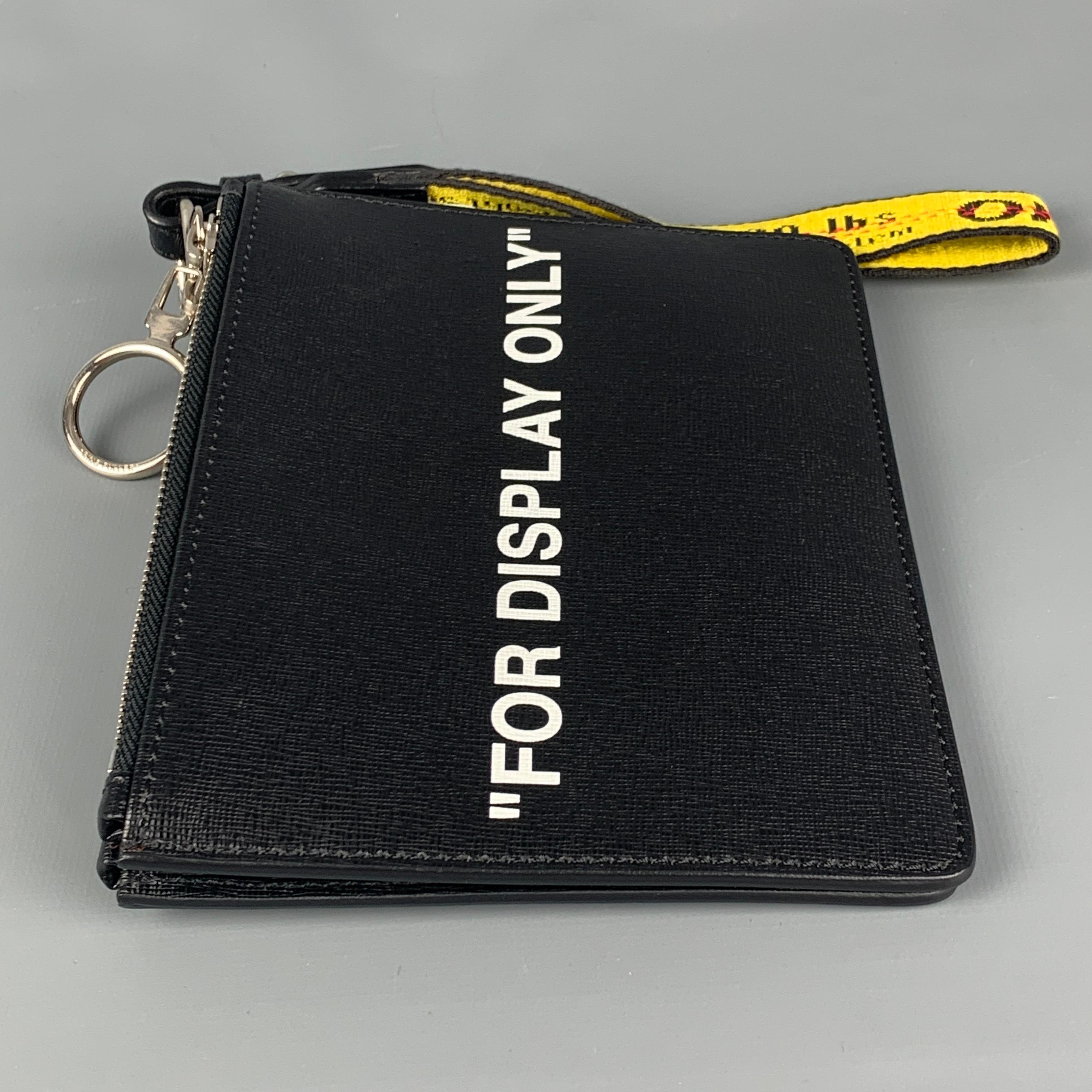 OFF-WHITE by Virgin Abloh double pouch comes in a black leather featuring a detachable design, 