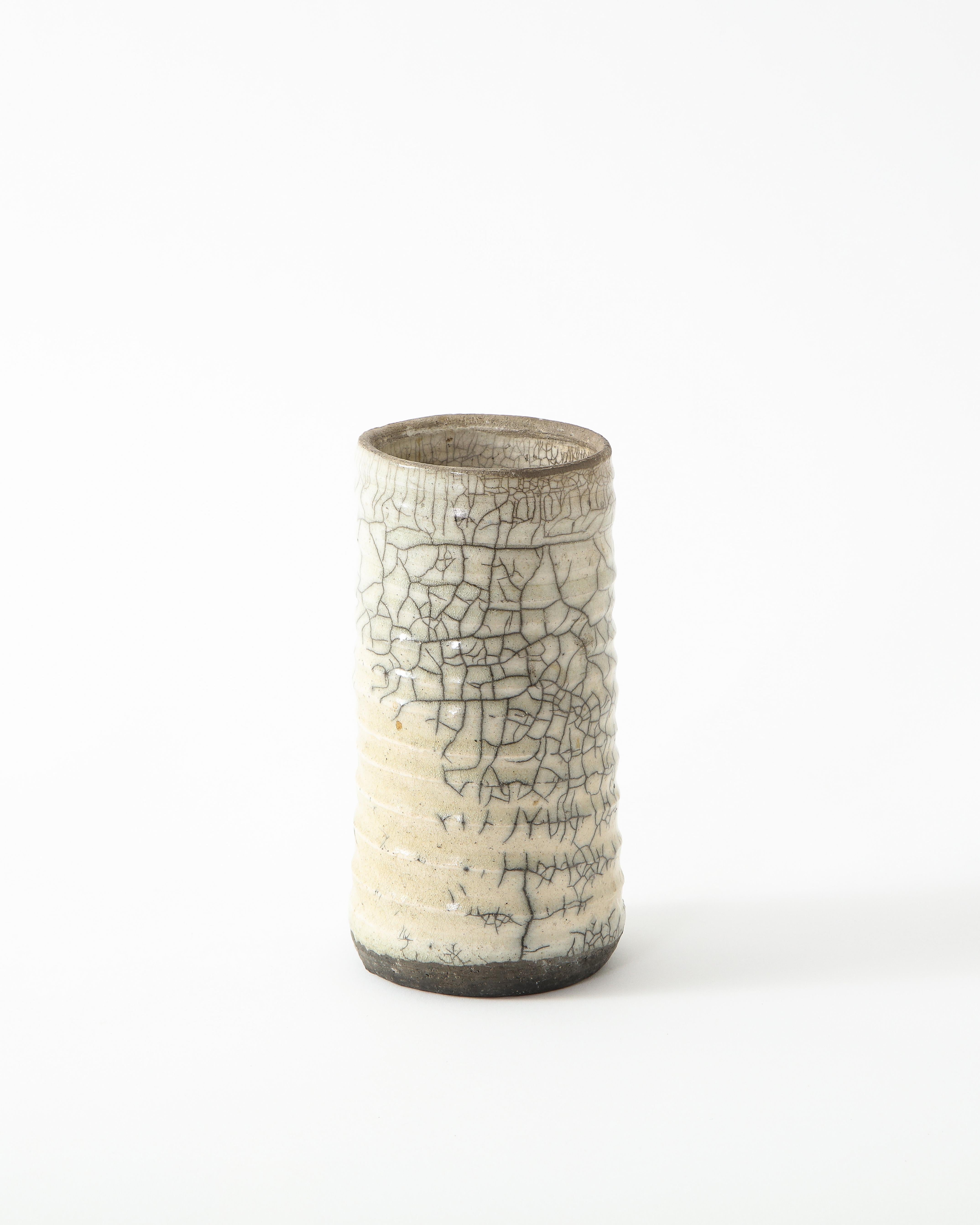 Glazed Off-White Ceramic Vase with Intricate Crackling