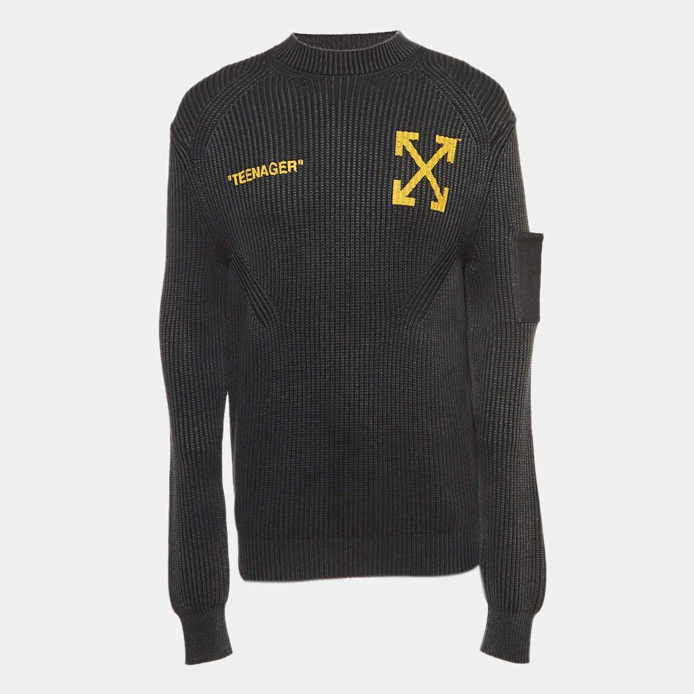The Off-White sweater is a stylish and cozy garment featuring a charcoal black knit with a distinctive flame and Bart Simpson graphic print. The sweater combines urban flair with comfort, making it a trendy addition to any fashion-forward wardrobe.

