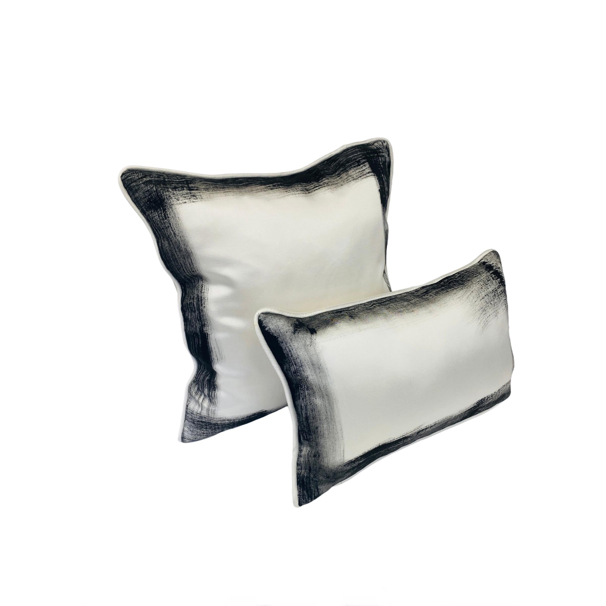 Authentic Italian silk wool in off white. The luxury fabric is a blend of Italian virgin wool and silk, which makes for greater durability. This gives a perfect softness and sheen to the pillows, complementing any interior decor. The wool