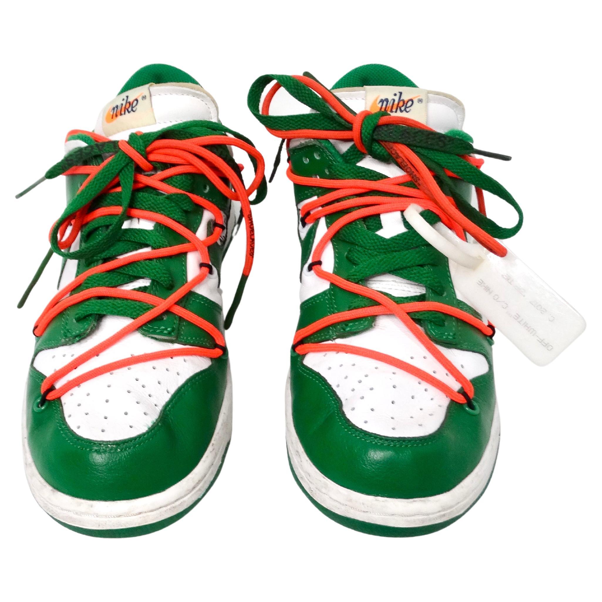 The Off-White for Nike Dunk Low Pine Green Sneakers from 2019 exemplify a perfect fusion of streetwear attitude and high-fashion innovation. Crafted with premium materials, these sneakers feature a sleek pine green leather upper accented by