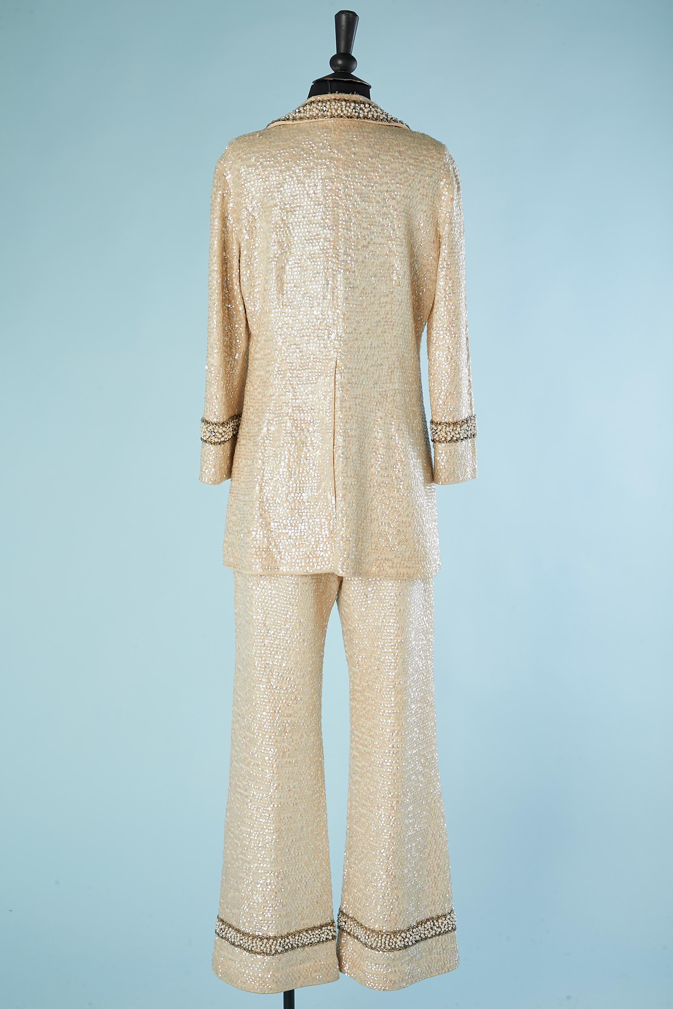 Off white knit jacket and trouser ensemble with beadwork and sequin De Paul NY  For Sale 1