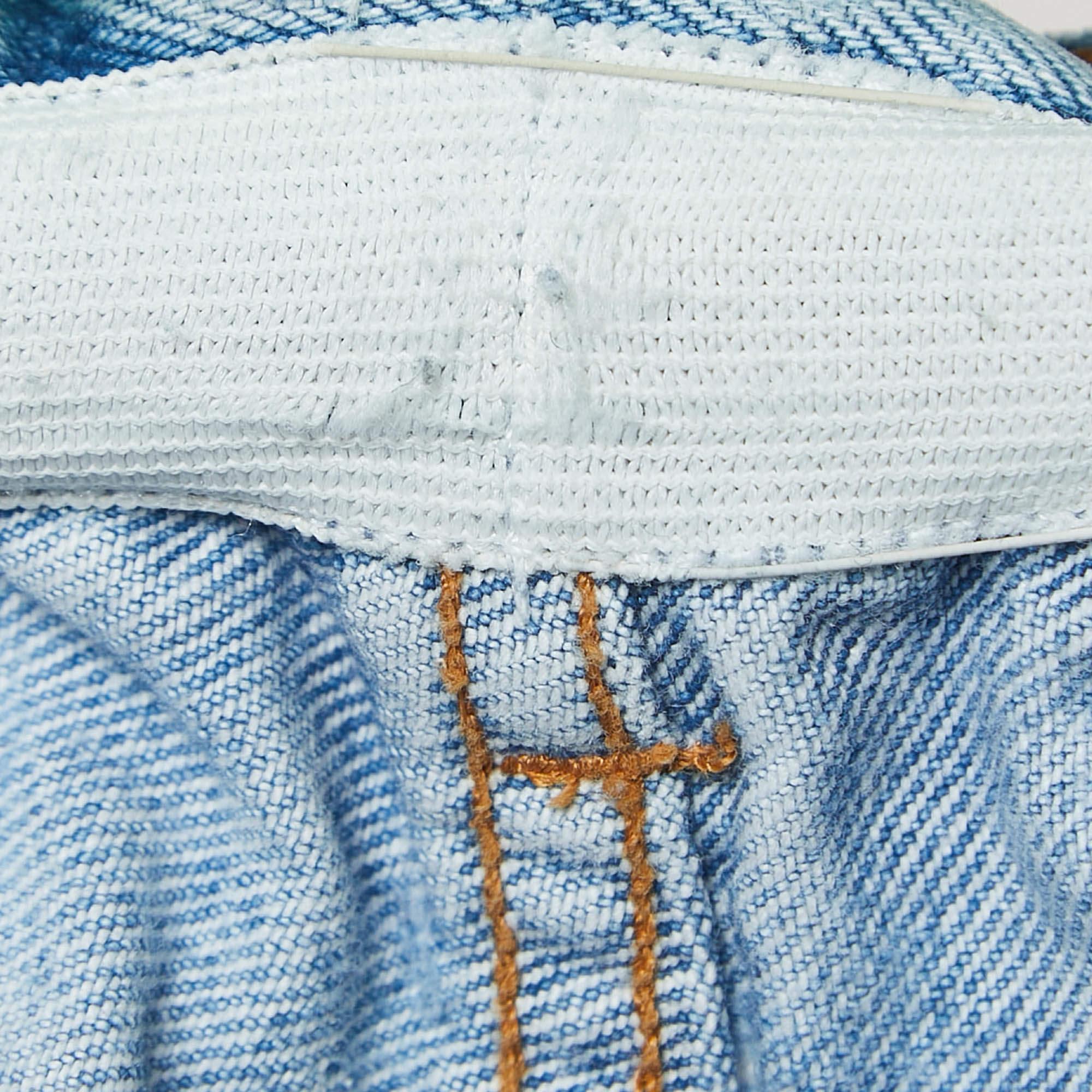 Off-White Vaqueros azul claro apenados con botones y cintura de saco de papel M Cintura 30 en venta 1