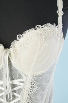 Off-white lingerie bustle with padded-bra and suspender belt  Nina Ricci