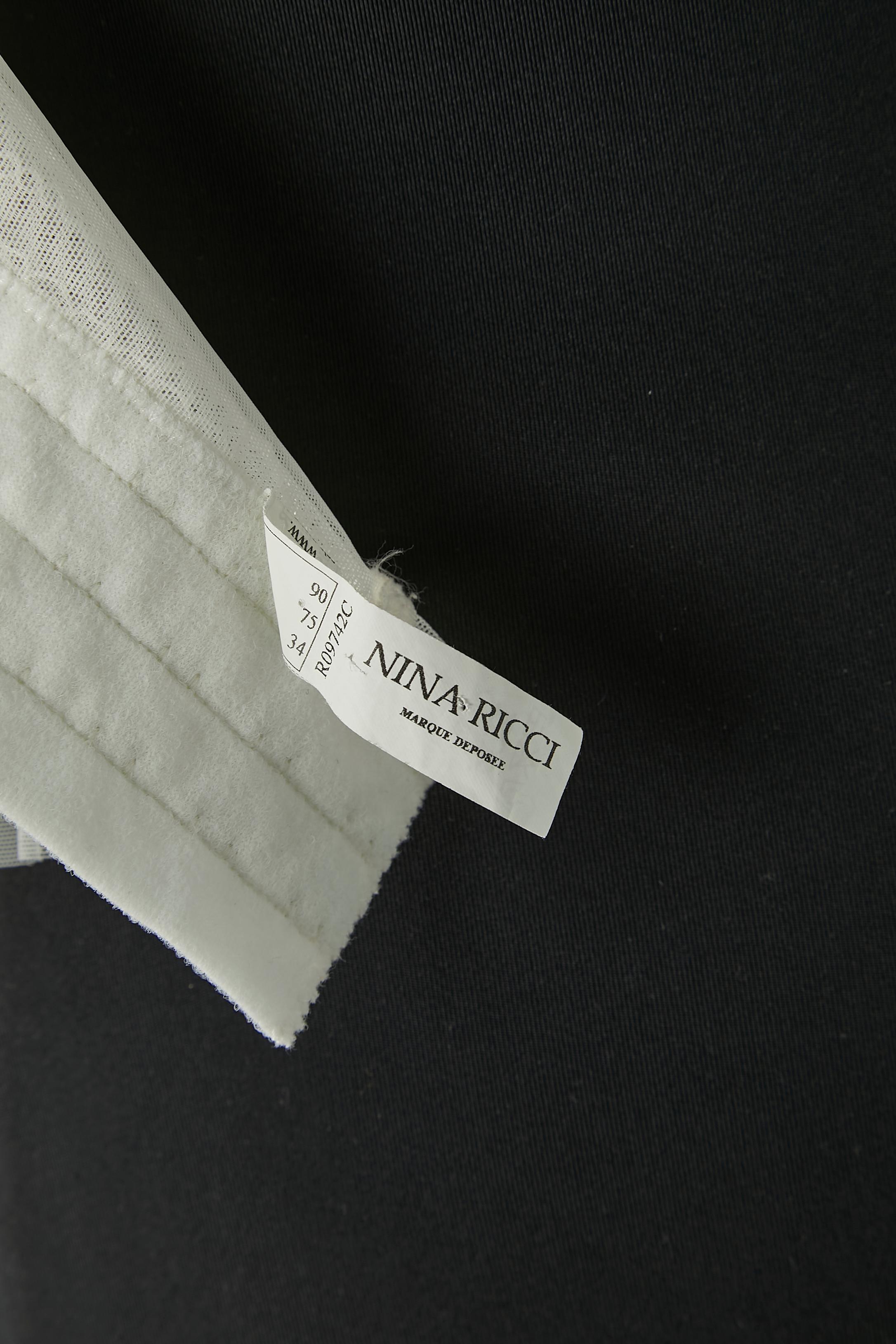 Buste de lingerie blanc cassé avec ceinture rembourrée et ceinture suspendue  Nina Ricci  Pour femmes en vente
