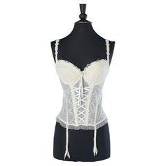 Off-white lingerie bustle with padded-bra and suspender belt  Nina Ricci 