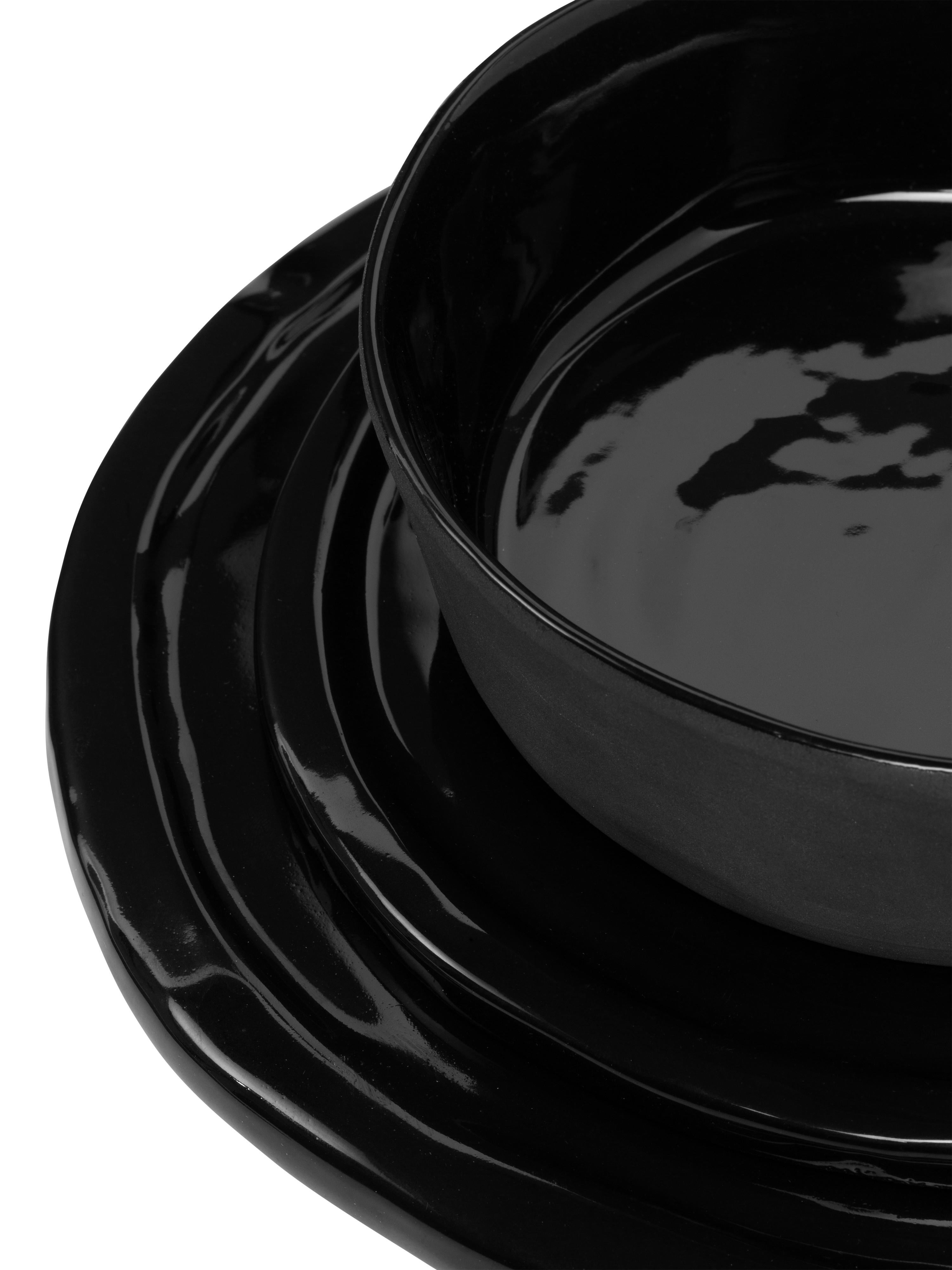 This object has been made from ceramic using an artisan method. Each piece is unique in terms of finish, colours and details. Lunch Set finish is mat black outside and Glossy Black inside. Lunch set includes two flat plates, big and medium size,
