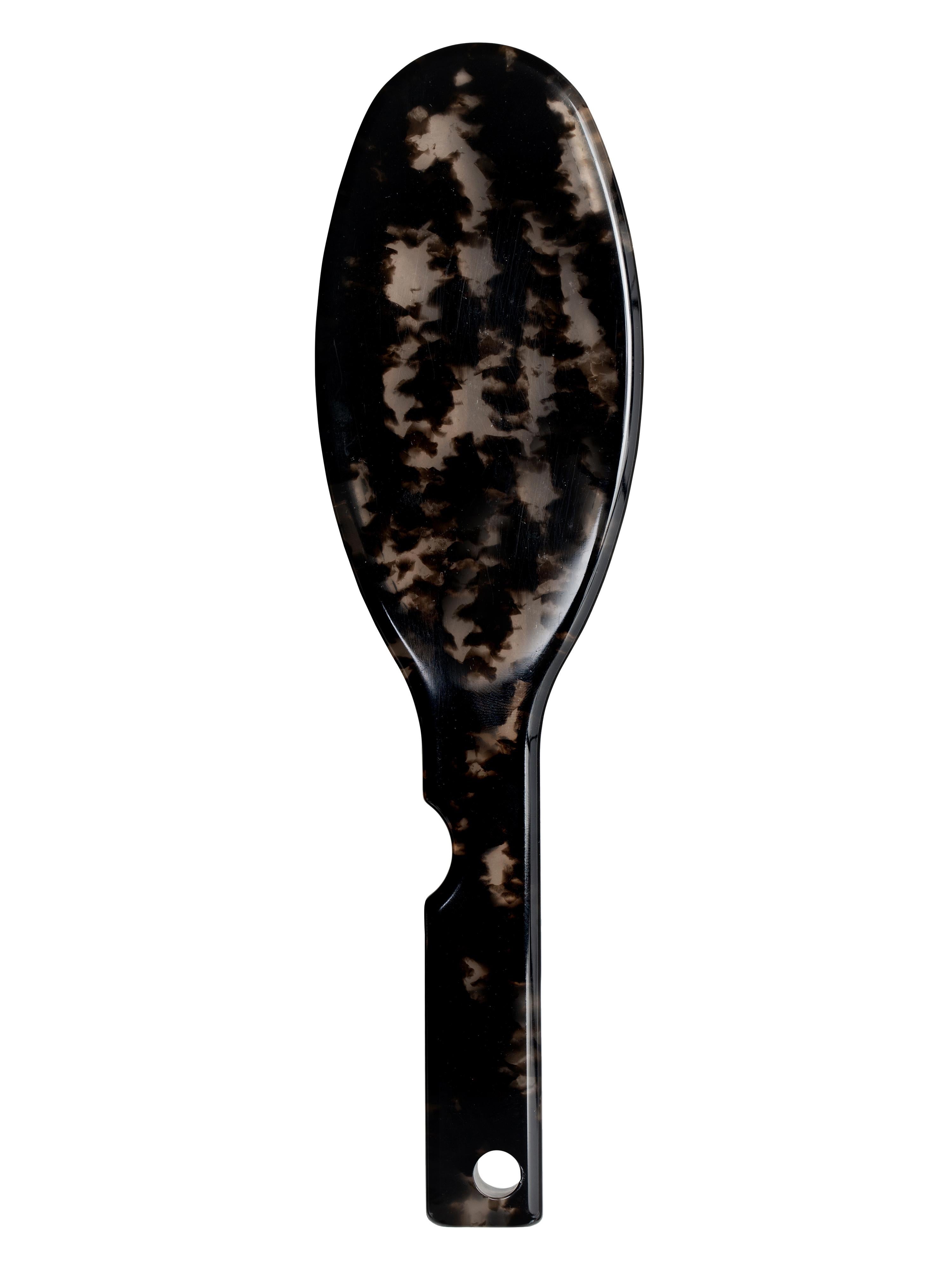 Hair Brush in Havana black and brown marble acetate with cylindrical gold metal pins. Handle is holed with man swimming logo gold impressed
By Virgil Abloh
Dimensions: 5.6 W x 20.1 H
This item is only available to be purchased and shipped to the
