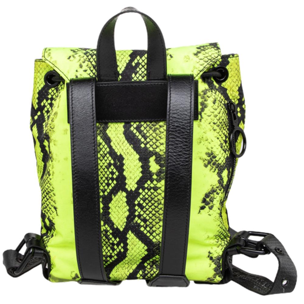 Born from where streetwear and high fashion meet, Off-White, inspired by youth culture, creates statement pieces with a distinctive aesthetic and this neon green backpack is no exception. Featuring adjustable shoulder straps, a top handle, a