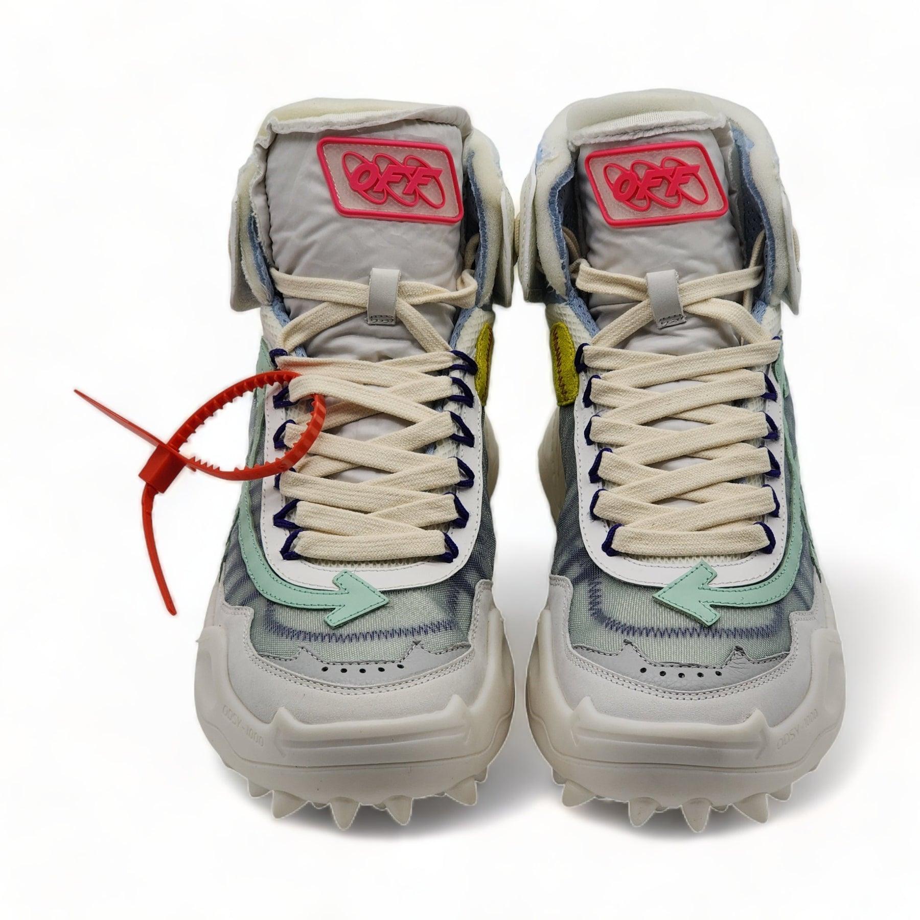Off-White ODSY 1000 Hi Top Sneakers White Pale Blue.

Fluorescent arrow logo on the sides.

Additional information:
Style code: OMIA162S208000420133
Color: White
Size: 40 EU (7 US Men  10 US Women)
Country: Italy
Condition: Include: original