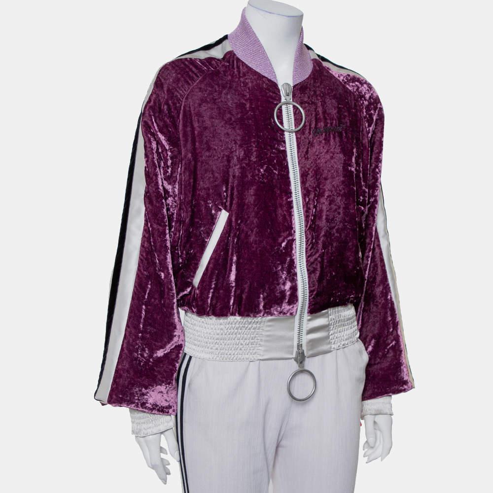 Reflecting urban style and effortless dressing, this bomber jacket from Off-White is just perfect! The purple crushed velvet creation features a front zip closure and has been styled with ribbed trim collars and contrasting bottom hemlines. It is