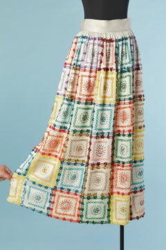 Off-white satin skirt with multicolor beads, rhinestone and sequin Circa 1970's