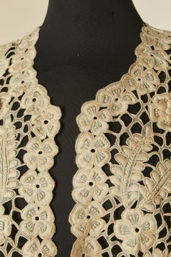 Off-white see-through lace guipure edge to edge coat