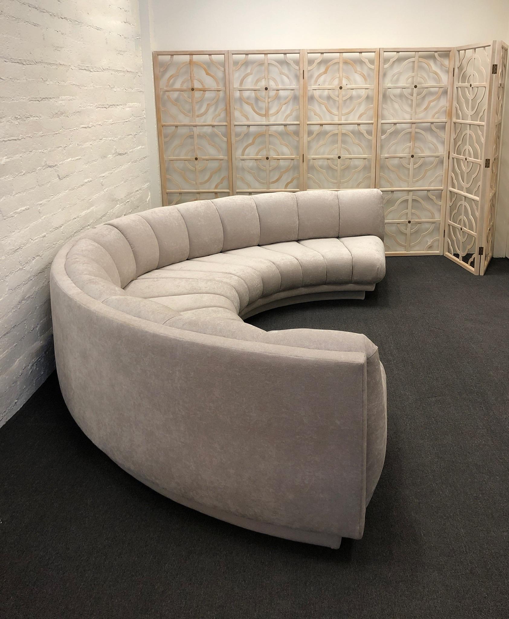 1990’s Glamorous off white channel two piece half circle sectional sofa by Steve chase.
Newly recovered in a soft off white chenille fabric. 
Overall dimensions: 155” Wide, 80” Deep, 33” Deep and 18” Seat.