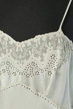 Off-white silk slip dress with hand-made embroideries and appliqué Circa 1930's