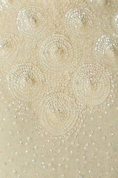 Off-white sleeveless knit top with sequin embellishment DRAGON HOUSE