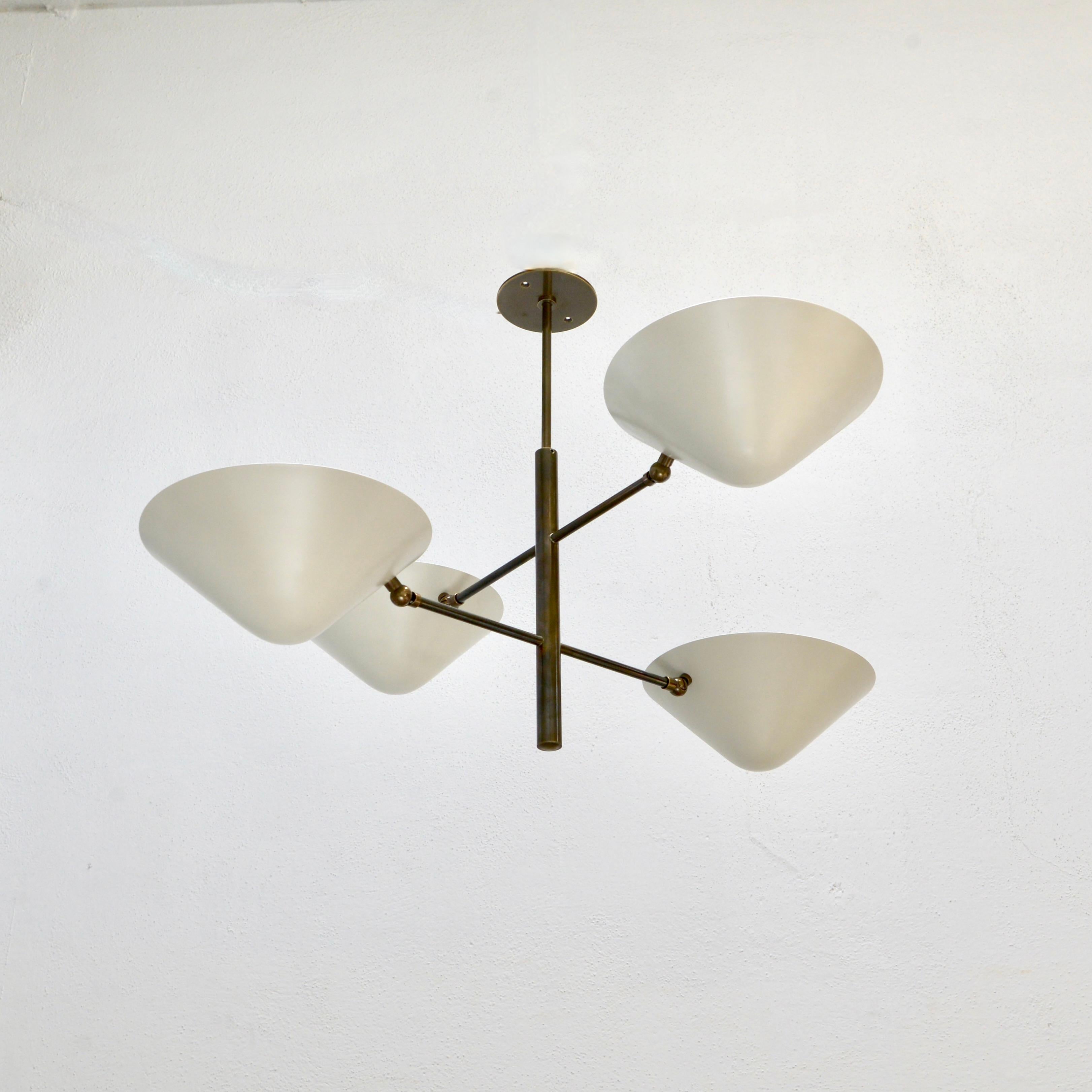 This organic inspired chandelier is a smaller version of the Off White Tree Chandelier. These fixtures combine geometry with botanical aspects. This smaller inspiration has 4 top open shades for indirect lighting. Wired with a single E26 medium