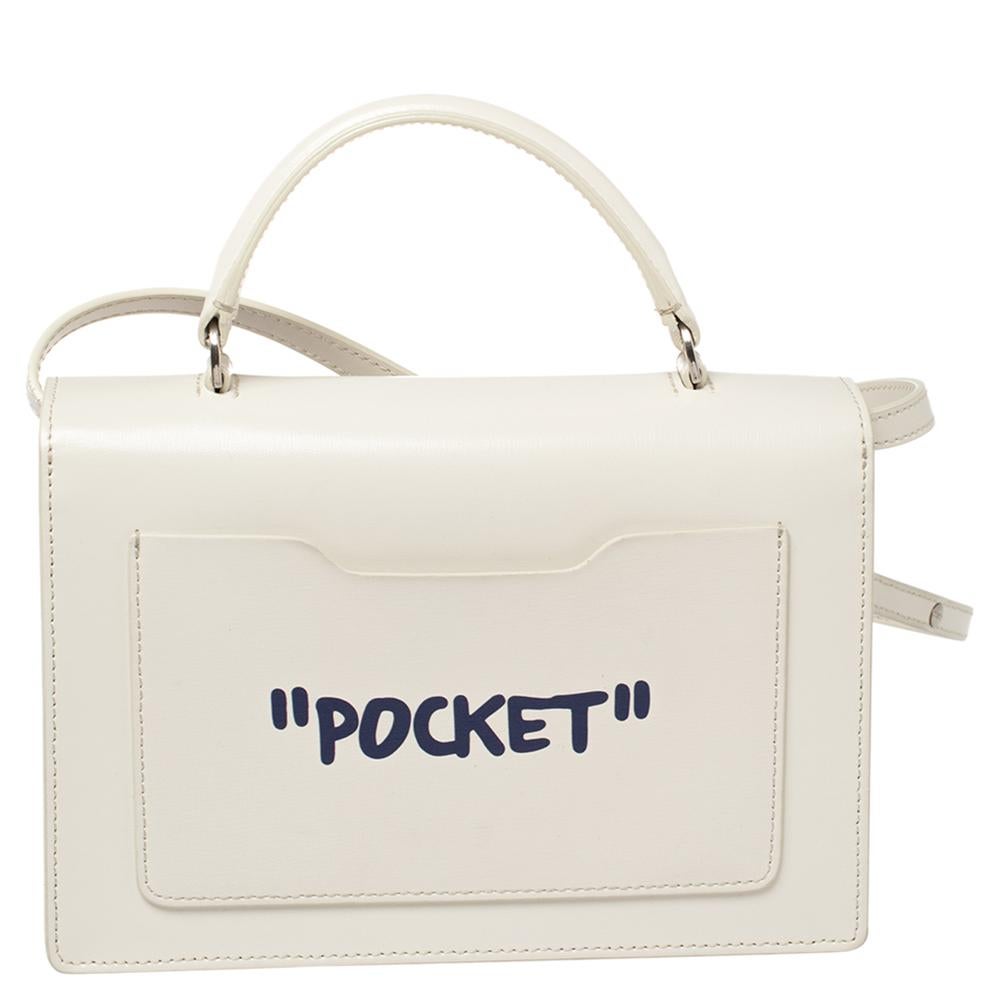 This lovely OFF-WHITE bag is a true embodiment of the brand's quirky aesthetic. It has been crafted from white-hued leather and comes with signature detailing that adds a fun style to the top handle bag. It has a front flap with a turn-lock closure,