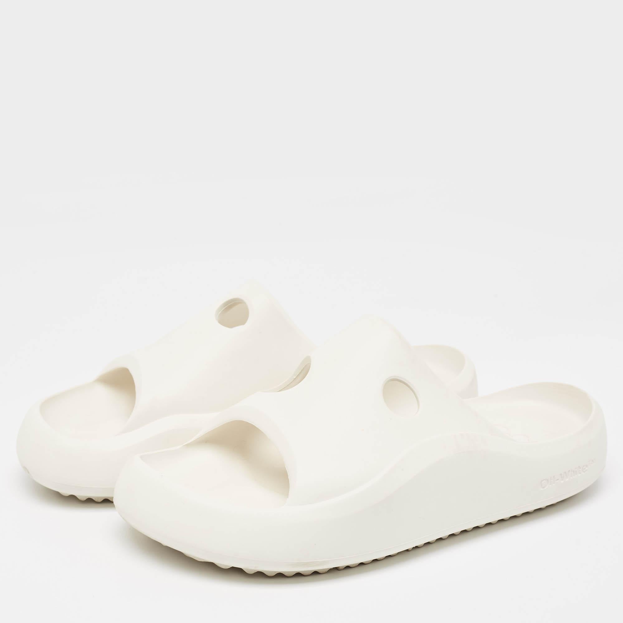 Enhance your casual looks with a touch of high style with these designer slides. Rendered in quality material with a lovely hue adorning its expanse this pair is a must have