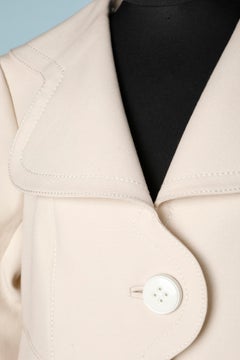 Off-white wool coat with belt and metal buckle Circa 1960/70's