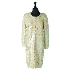 Off-white wool knit coat covered with pearly sequins Norma Kamali 