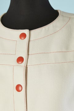 Off-white wool skirt-suit with short sleeves and orange snap Courrèges
