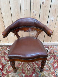 Office armchair – Napoleon III style – Oak and leather – 19th century.