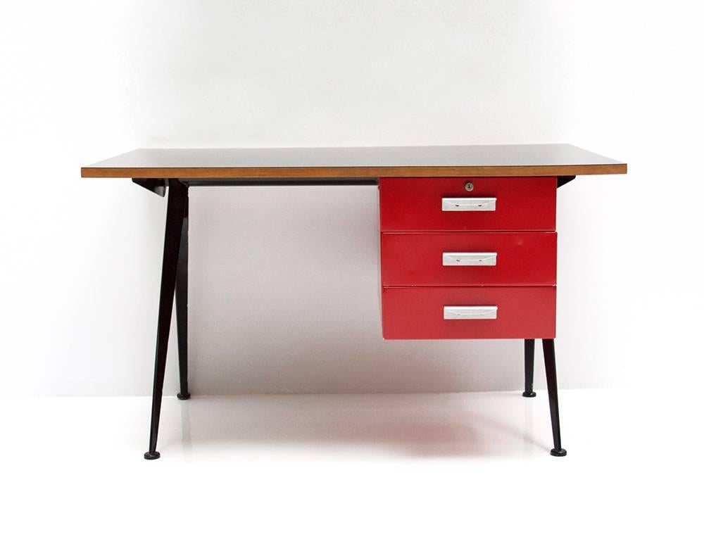 Office desk Compas designed by Jean Prouvé. Version with bent lacquered steel, metal casing and drawers and a painted laminated plywood,
circa 1950, France.
  