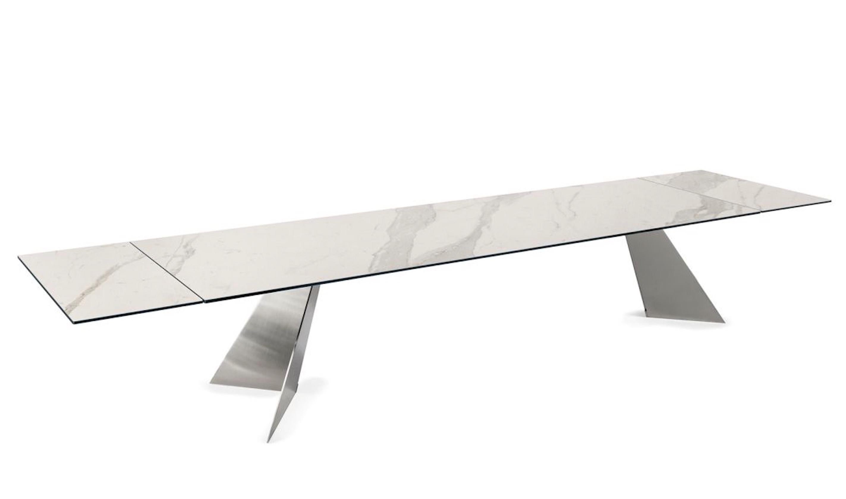 INGENTS – Extendable Dining Table
Design: Naos

Part of The Giants collection, the Ingents dining table is designed for grand interiors and special occasions, combining monumental dimensions with refined elegance. Thanks to its innovative Naos