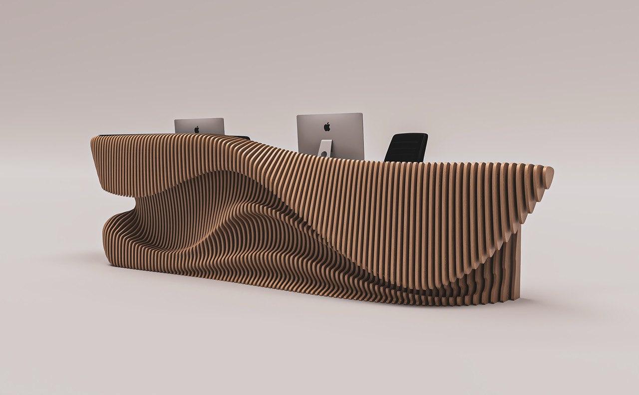 A striking blend of sculpture and function, this parametric reception desk features a fluid, dynamic form crafted
from 18mm plywood and reinforced with metal rods. Designed to be a statement piece, it transforms any
reception area into a modern,