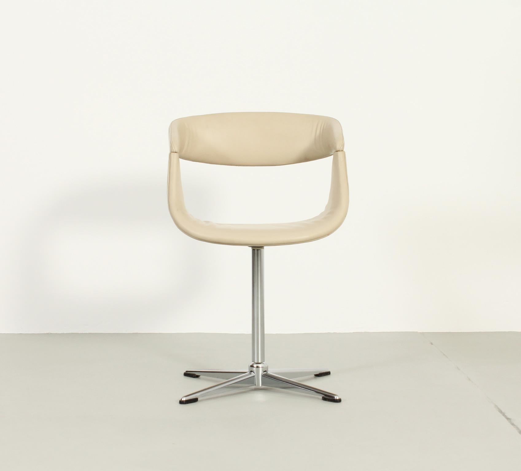 cream swivel office chair