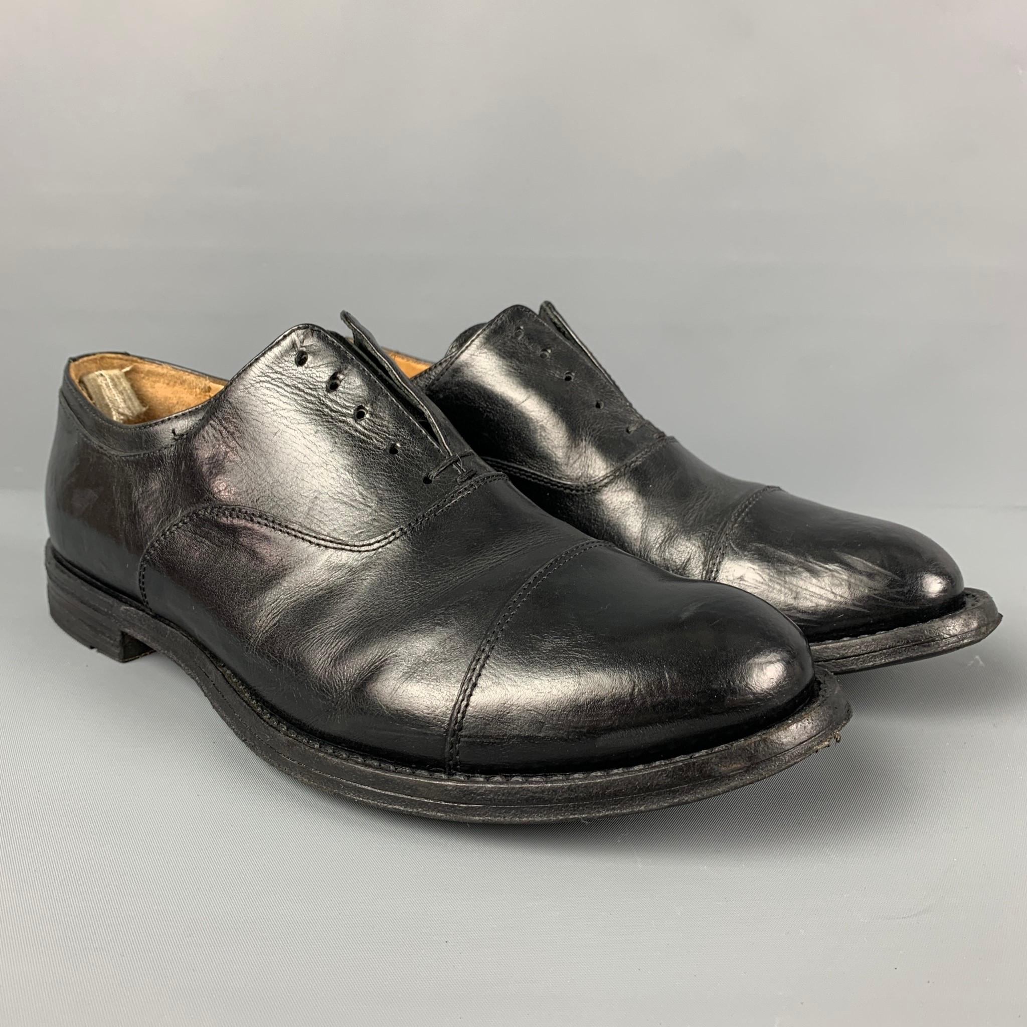 OFFICINE CREATIVE shoes comes in a black leather featuring a cap toe and no laces. Made in Italy. 

Good Pre-Owned Condition.
Marked: 15 41

Outsole: 12 in. x 4.25 in. 