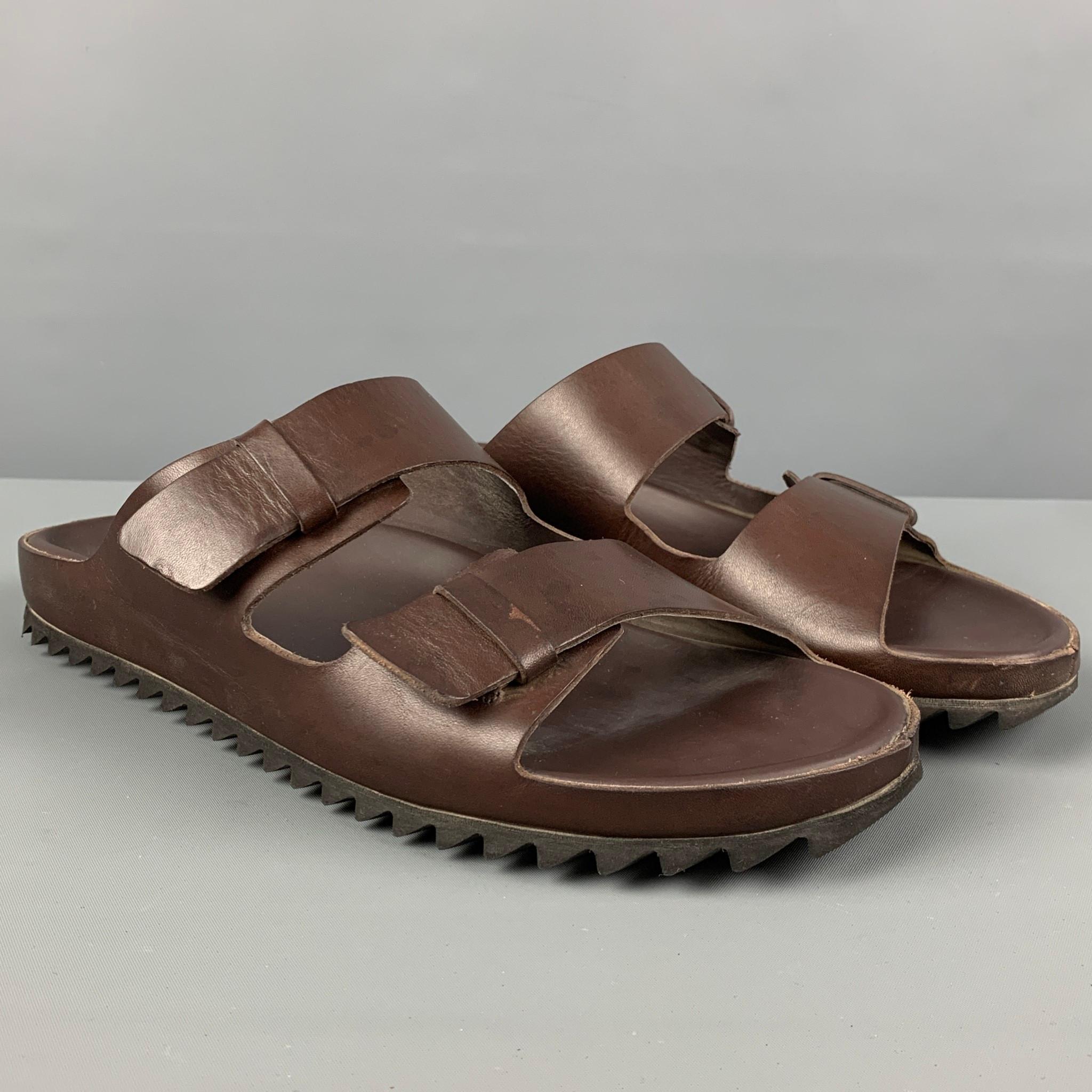 OFFICINE CREATIVE sandals comes in a brown leather featuring a hook & loop closure and a ribbed rubber sole. Includes box. 

Very Good Pre-Owned Condition.
Marked: 42
Original Retail Price: $445.00

Outsole: 11.5 in. x 4 in. 