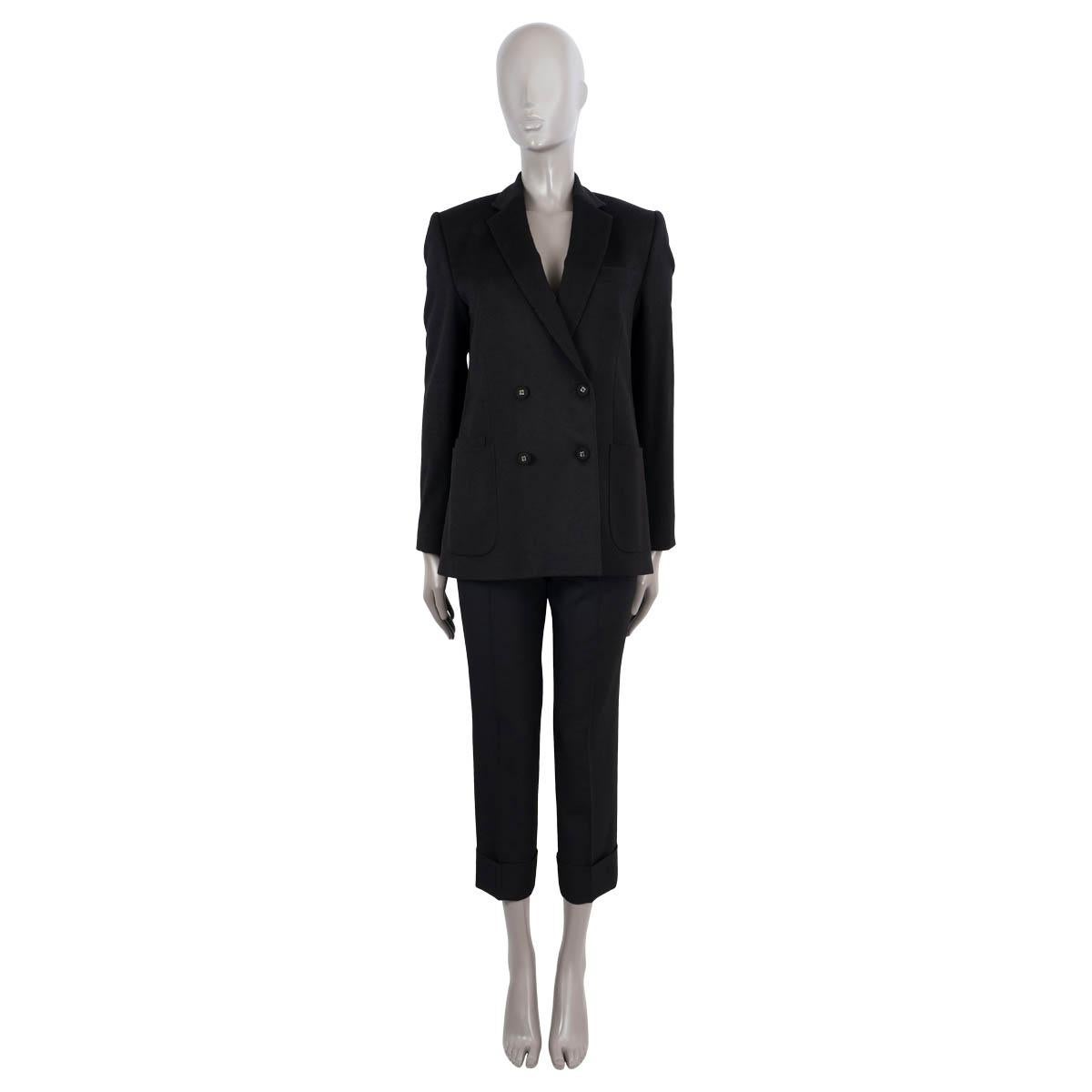 100% authentic Officine Générale double-breasted blazer in black wool (100%). Features notch lapels, two patch pockets on the front with an additional patch money pocket and buttoned cuffs. Closes with fabric covered buttons. Lined in viscose