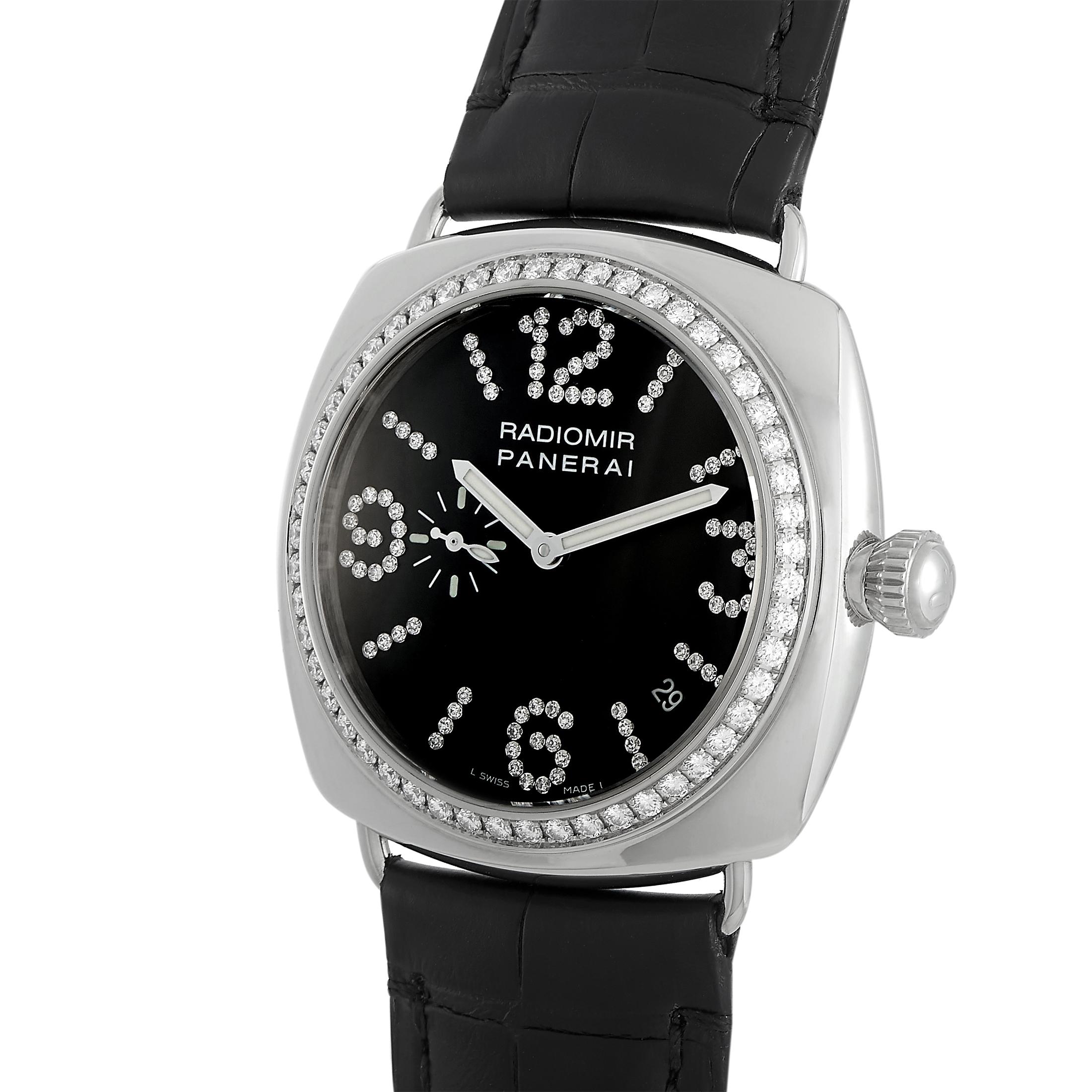 The Officine Panerai Radiomir watch, reference number PAM00134, is presented with a 40 mm 18K white gold case that boasts see-through back and a diamond-set bezel. The case is water-resistant to 30 meters and mounted onto a black leather strap,