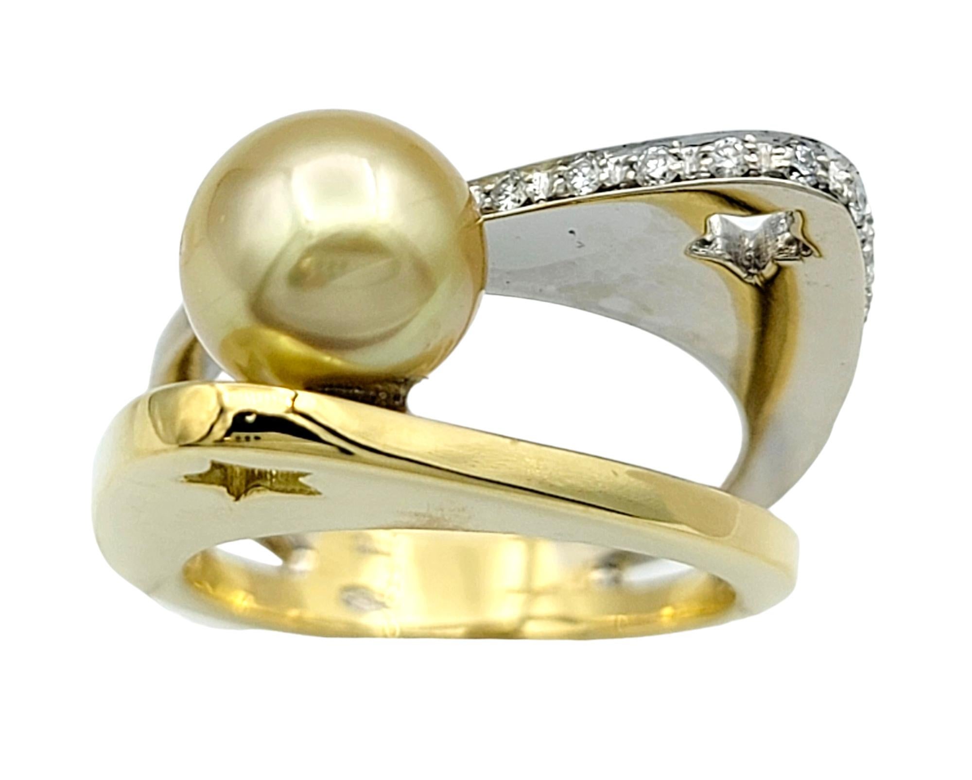 Ring Size: 6.5

This exquisite pearl and diamond geometric cocktail ring is uniquely crafted in both white and yellow gold. At the center of this stunning piece lies a lustrous golden South Sea pearl, radiating elegance and sophistication.

Paired
