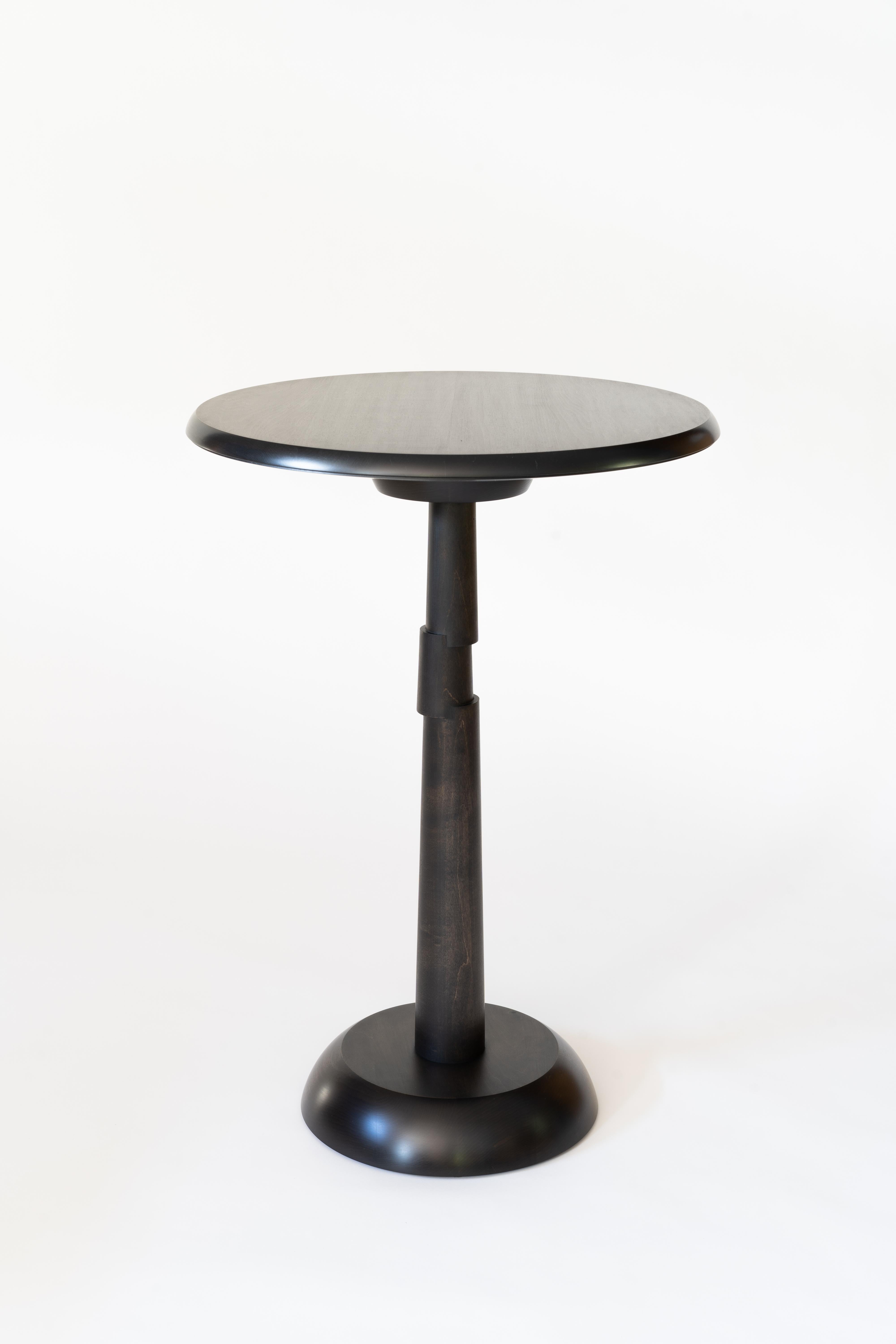 The offset pedestal side table is designed to be both classic and subtly unique, combining function with aesthetics. My intention in this design was to create a piece that referenced the ubiquitous pedestal table, but one that would offer a bit of