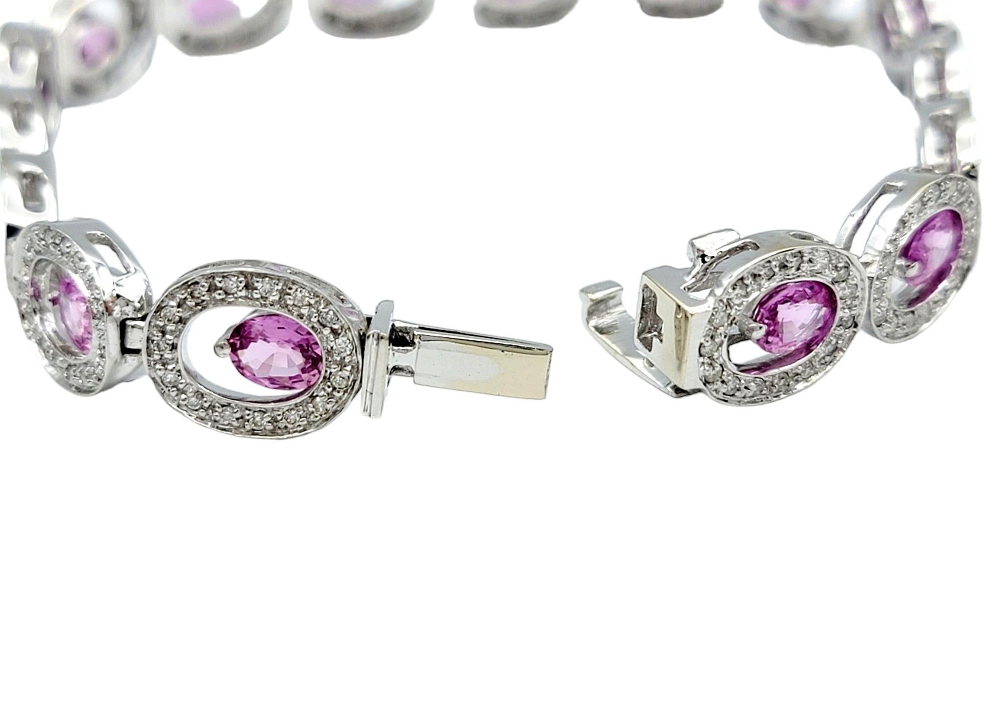Oval Cut Offset Pink Sapphire and Diamond Halo O-Link Bracelet in 14 Karat White Gold For Sale