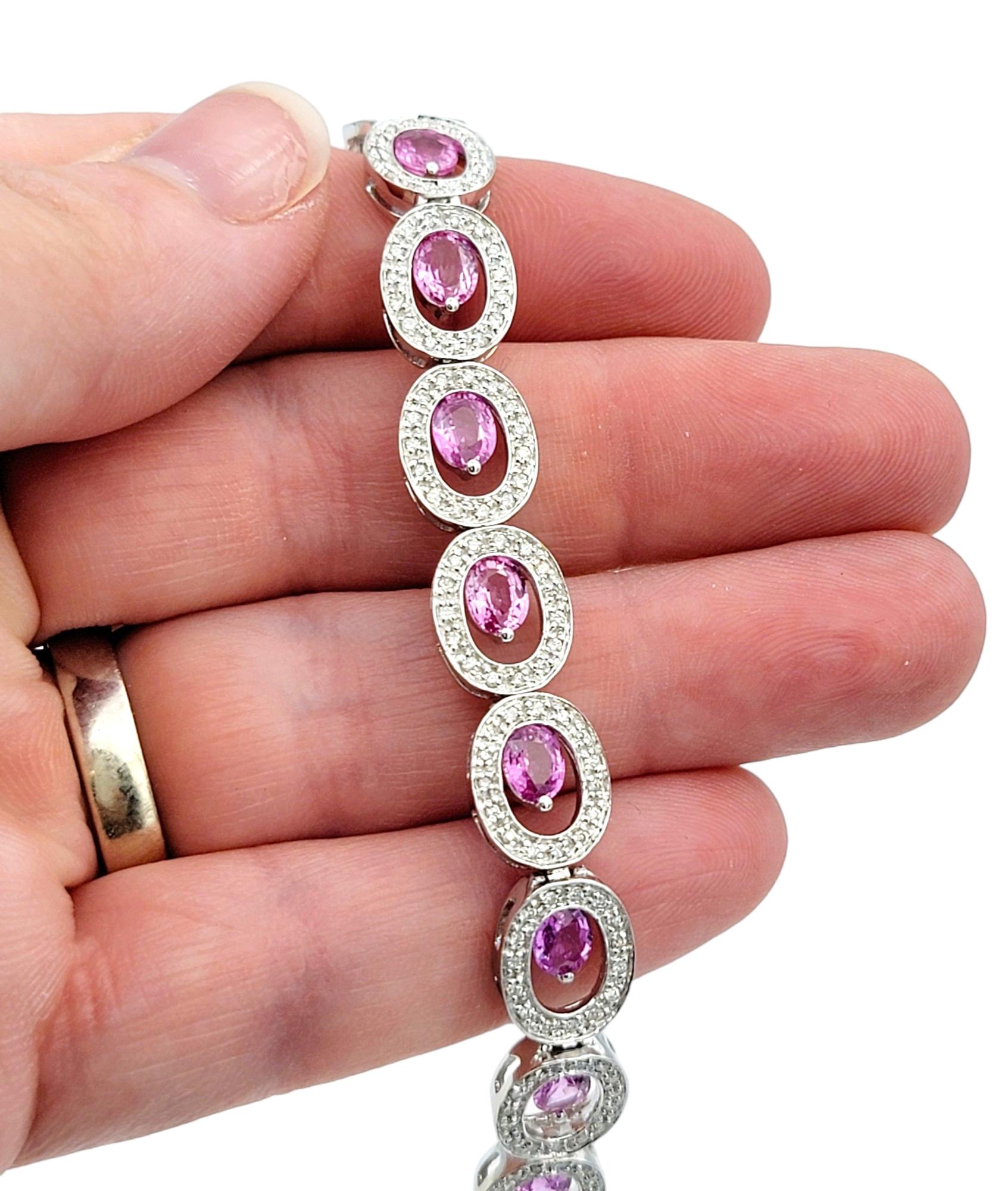 Women's Offset Pink Sapphire and Diamond Halo O-Link Bracelet in 14 Karat White Gold For Sale