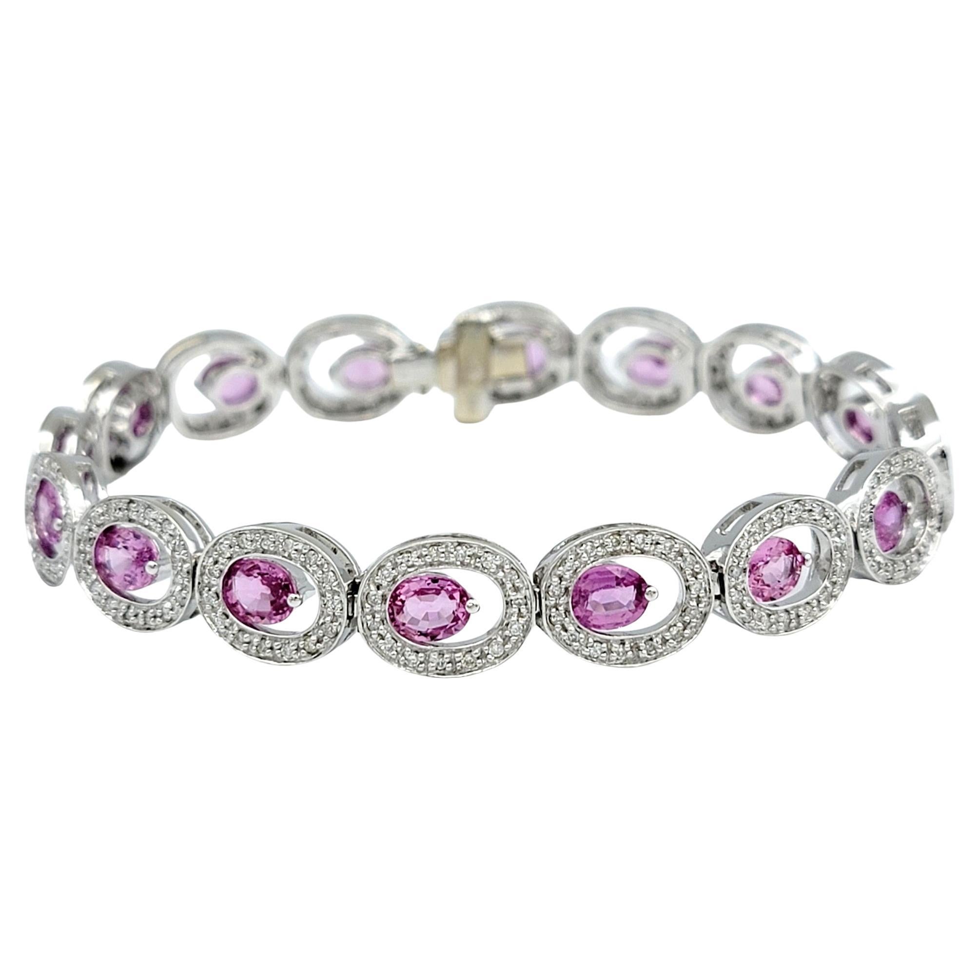 Offset Pink Sapphire and Diamond Halo O-Link Bracelet in 14 Karat White Gold For Sale
