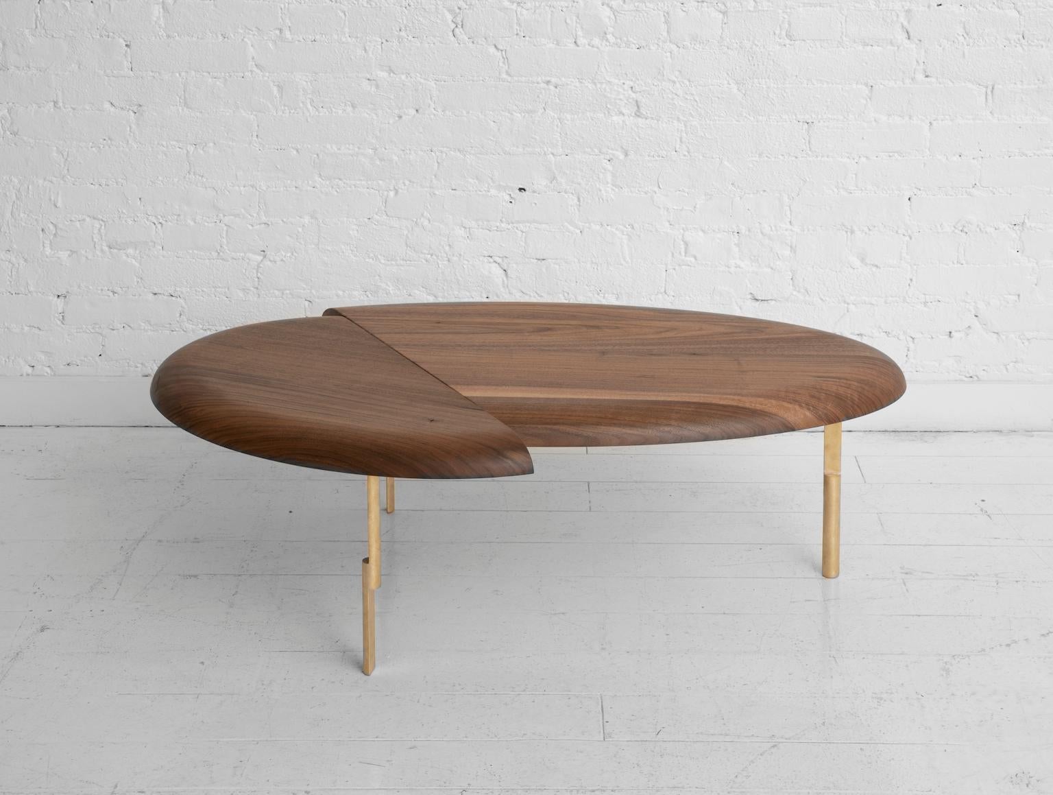 The first step in a series of side, coffee and dining tables based on the play between collaged biomorphic shapes and the contrast of rounded edges with cut planes. 

It is a piece that can be experienced in different ways depending on the angle