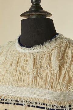 Offwhite sleeveless cocktail dress with fringes and flower ANNA RICCI Circa 1960