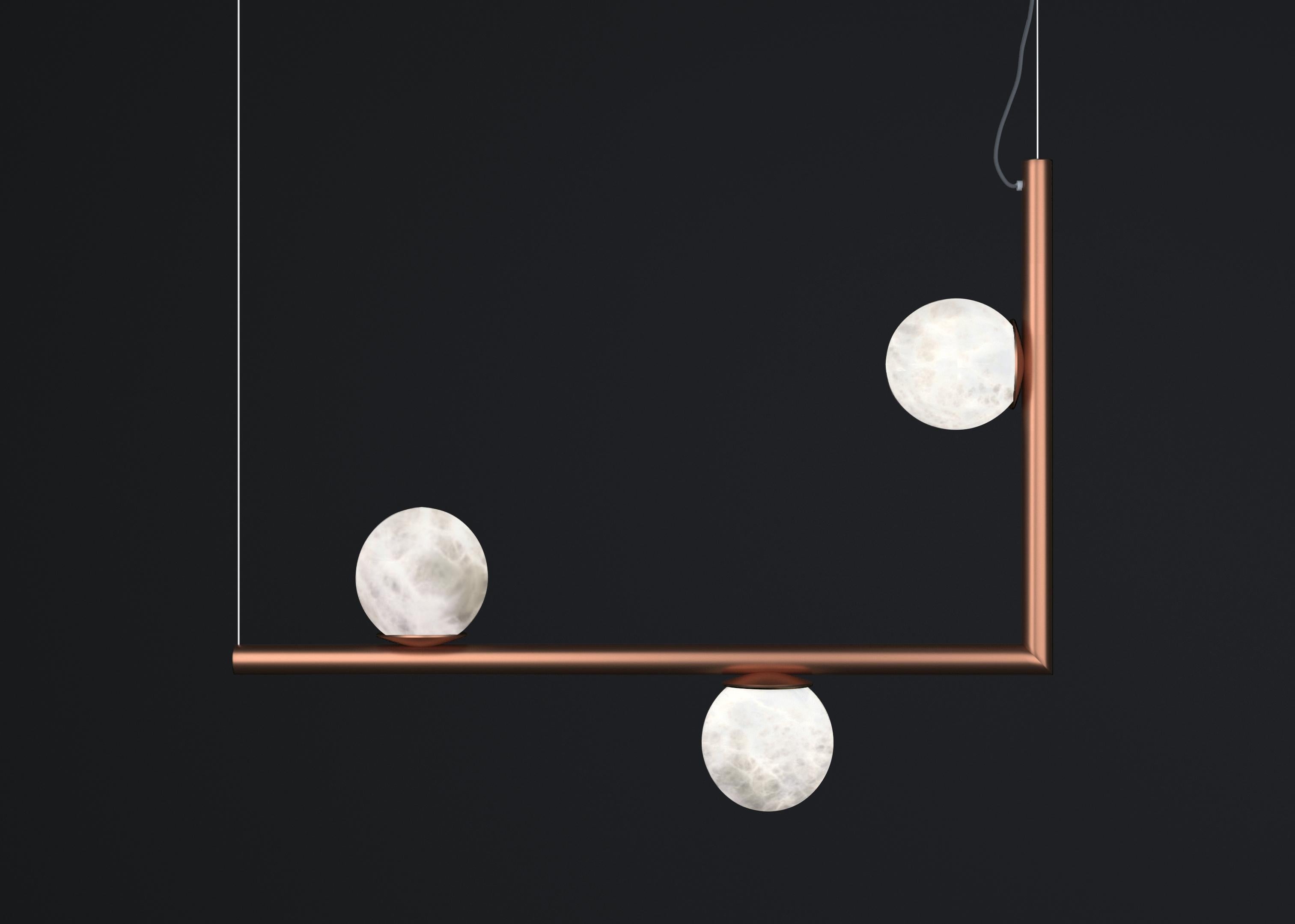 Ofione 1 Copper Pendant Lamp by Alabastro Italiano
Dimensions: D 15 x W 85 x H 64 cm.
Materials: White alabaster and copper.

Available in different finishes: Shiny Silver, Bronze, Brushed Brass, Ruggine of Florence, Brushed Burnished, Shiny Gold,