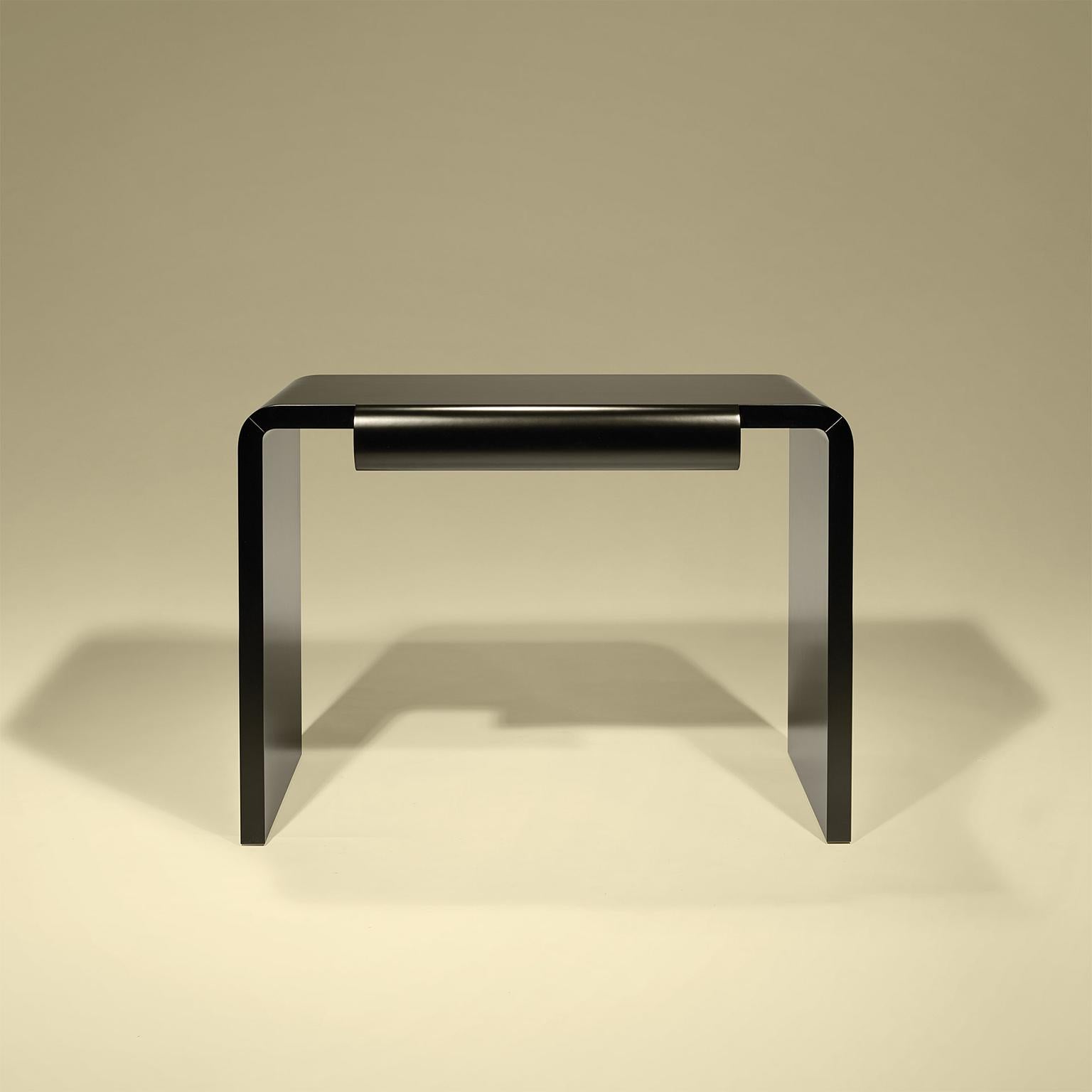 Desk in black lacquer with one drawer.

Bespoke / customizable
Identical shapes with different sizes and finishings.
All RAL colors available. (Mate / half gloss / gloss).