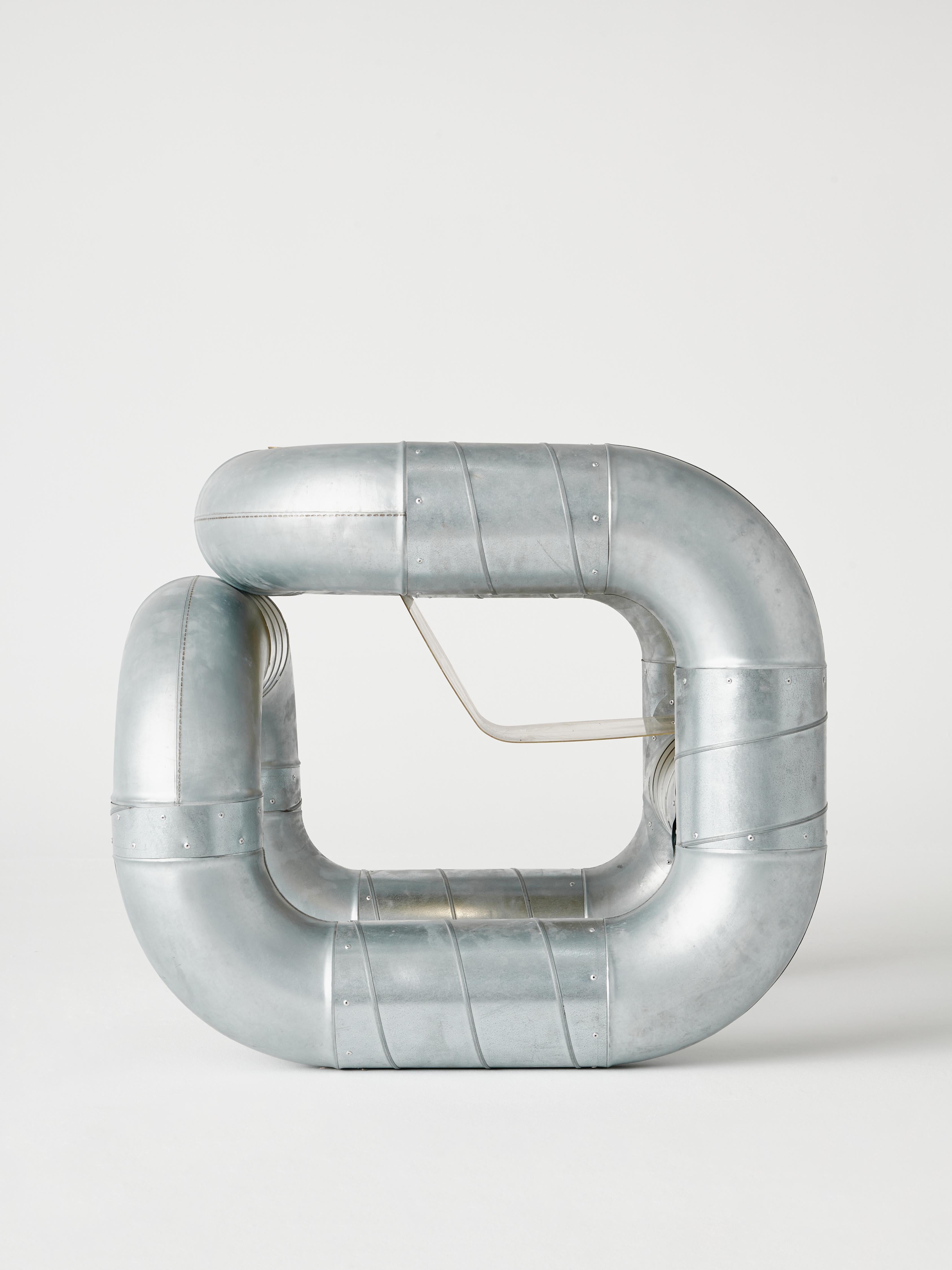 This tubular steel armchair forms part of the Series O.F.I.S (Objects From Intersticial Space), an ongoing research of industrial material's potential for narrative. Muñoz designed this tubular armchair as an exploration of the structural potential