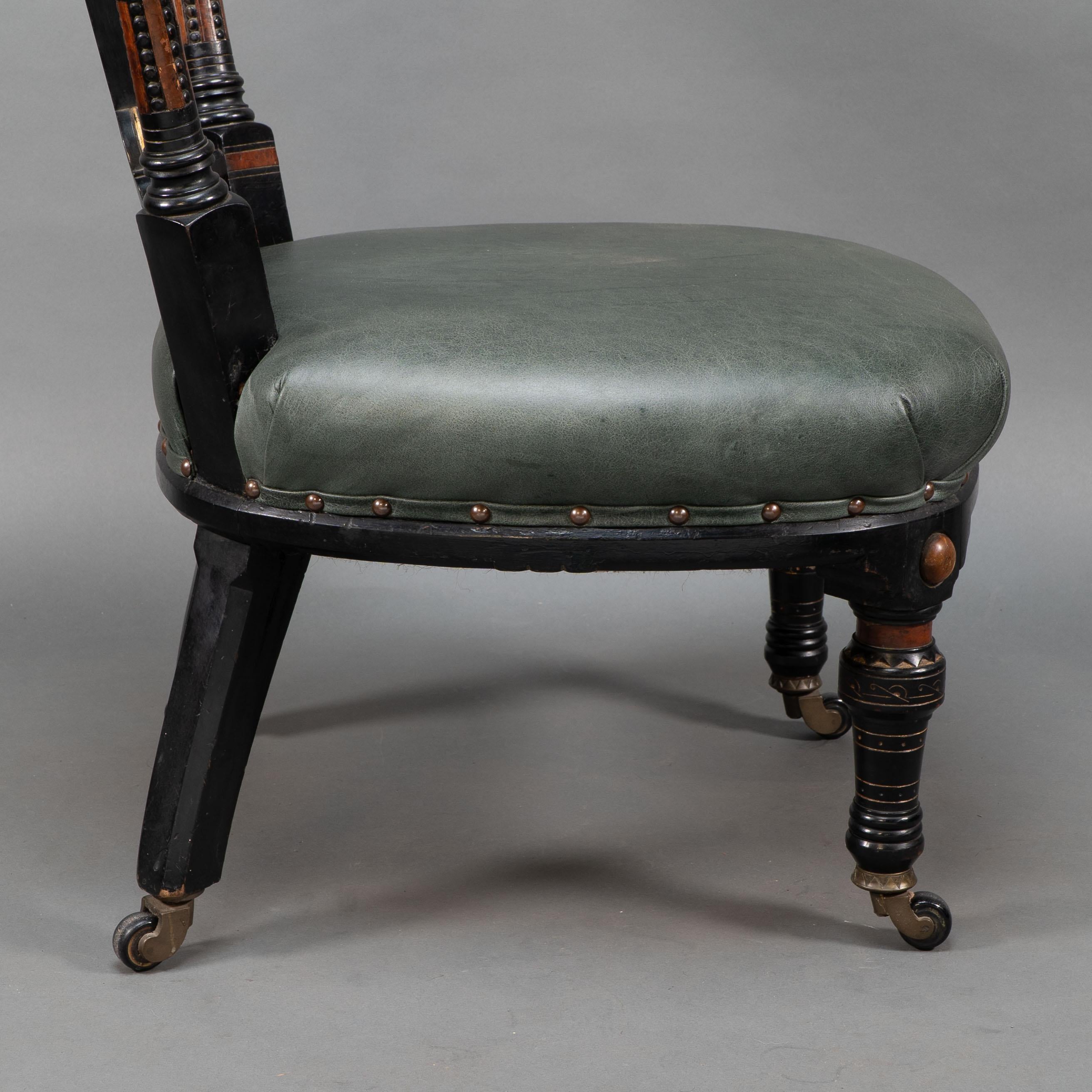 Ogdens Of Manchester. An Aesthetic Movement Ebonized & Parcel Gilt Nursing Chair For Sale 5